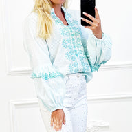"Lichte geborduurde blouse in licht turkoois