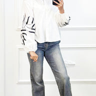 Witte Blouse met Zwarte Borduursels