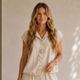 Oversized Reisblouse met Goudkleurige Broche - Beige