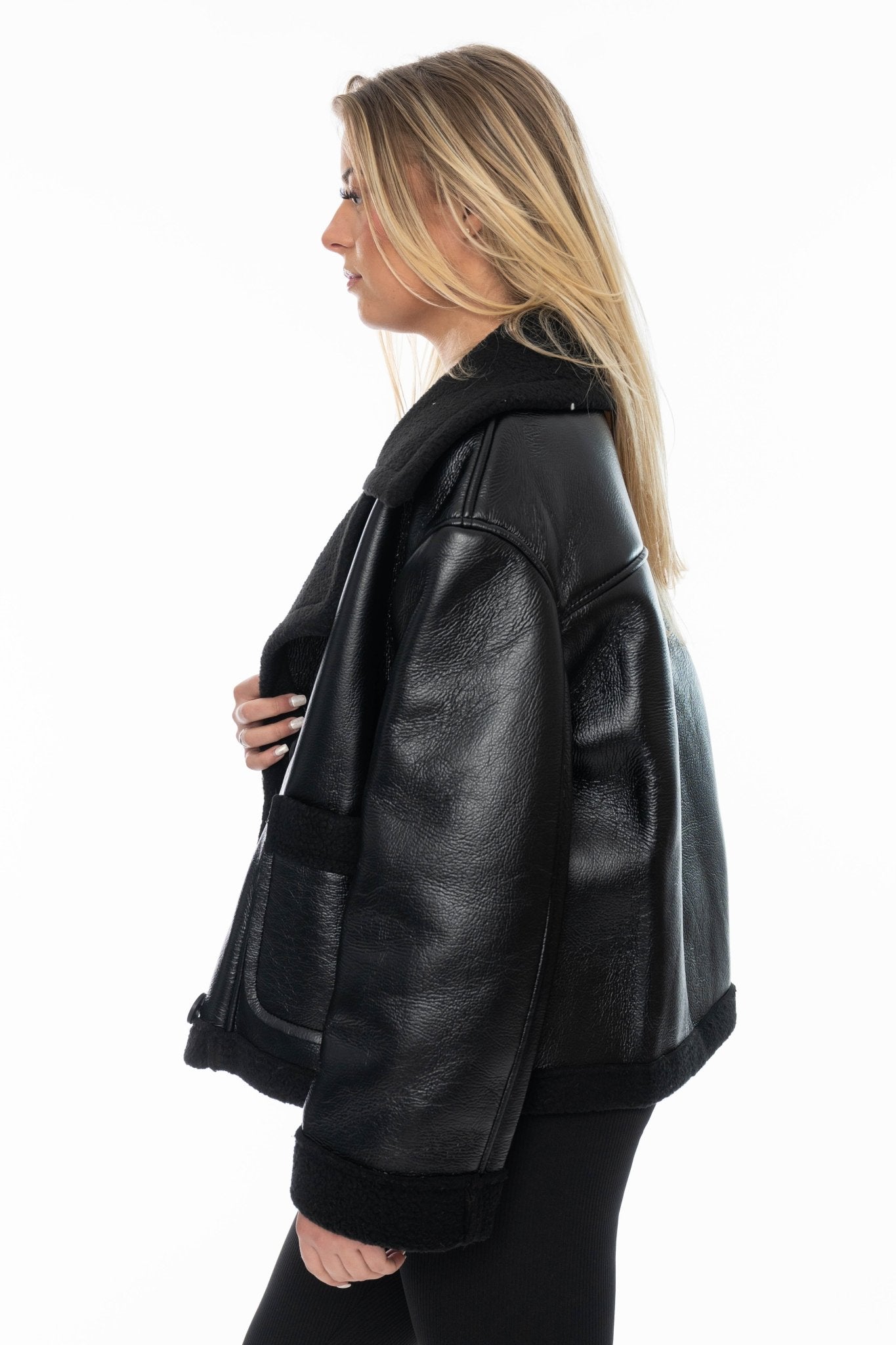 Zwarte dames faux leather jas – Teddy voering & oversized fit - BlushFashionstore